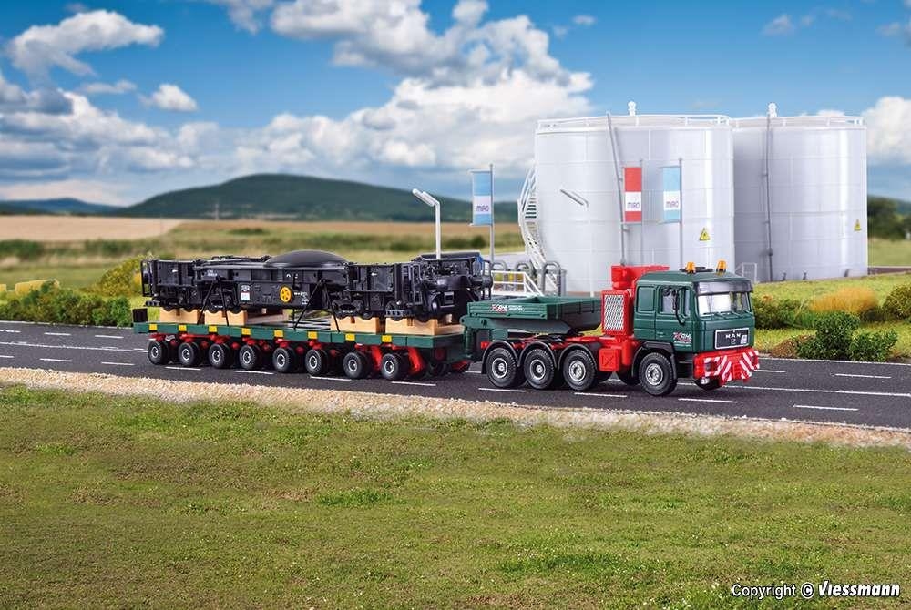 kibri-13601-h0-man-sk-mit-scheuerle-plattformwagen-undunterteil-schienenkran.jpg